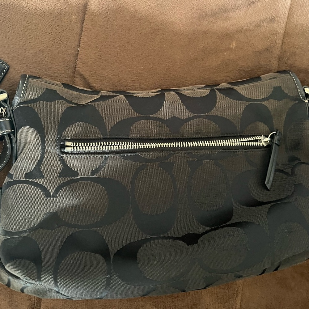 Brown and black coach bag